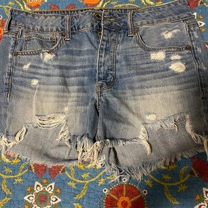 American eagle distressed Tom girl midi shorts